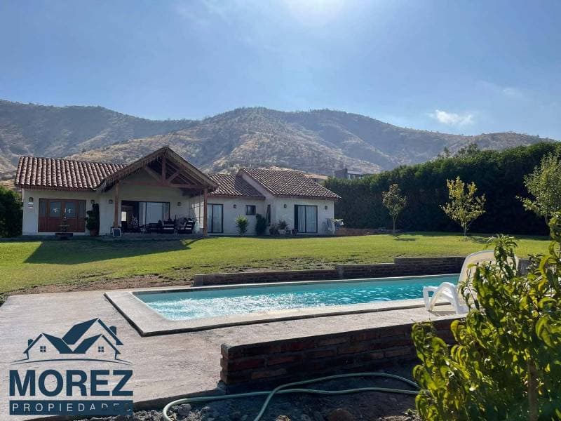 PARCELA CON DOS CASAS MODERNAS 5.000MT2 EN CONDOMINIO.      