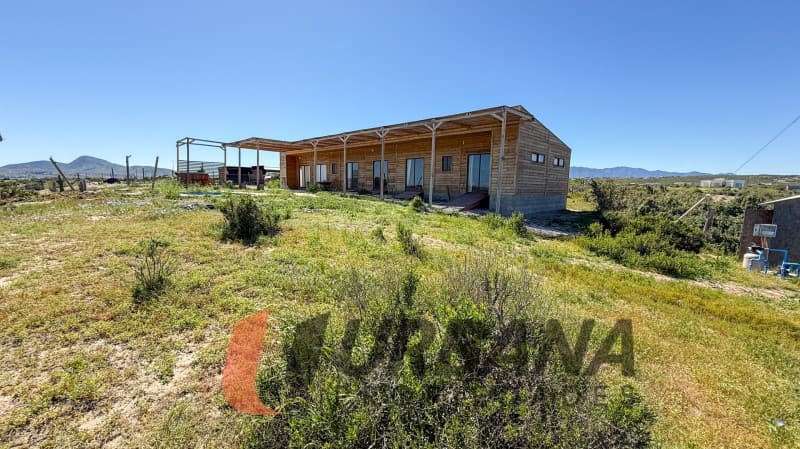 PARCELA CON CASA Y VISTA AL MAR EN TANGUEMAR II, TONGOY     