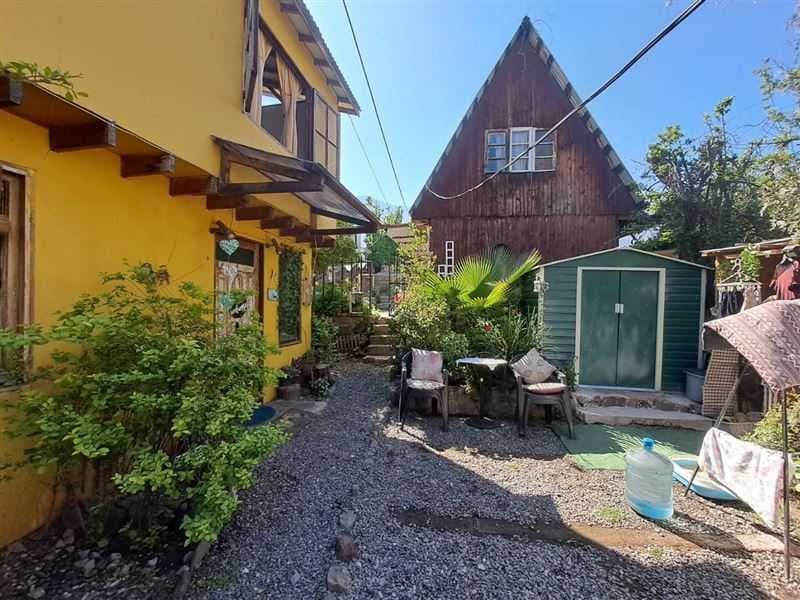 Sitio con 4 casas Villa El Progreso (161285)